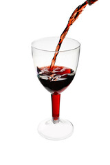 red wine pouring into glass