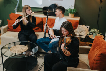 A group of individuals playing violin, flute, and clarinet in a warm living room atmosphere,...