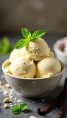 Creamy vanilla ice cream, fresh mint, vanilla bean specks in bowl, mint leaves, high-resolution, fragrance