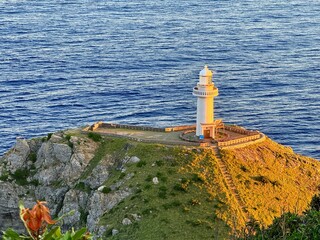 Golden sunset over Osezaki Lighthouse, Fukue Island, Goto Islands, Nagasaki, Japan – dramatic...