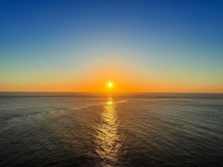 Golden sunset over Osezaki Lighthouse, Fukue Island, Goto Islands, Nagasaki, Japan – dramatic seascape and ocean cliffs with tranquil light on a remote headland.