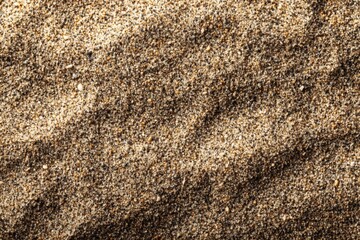 Close-up view of fine sand showing intricate textures and patterns at the beach during midday