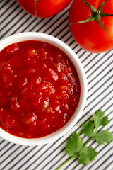 Organic Tomato and Cilantro Salsa in a Bowl, top view.