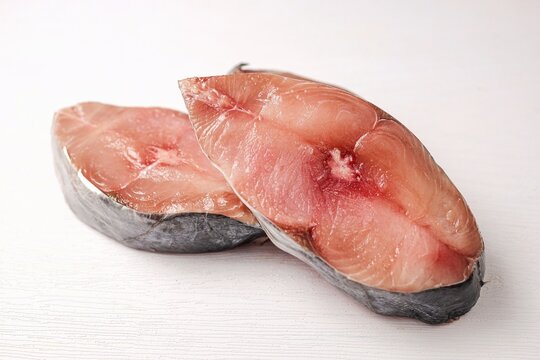 Fresh sliced Indo Pacific king mackerels, Spotted mackerels, Seerfishes on white background