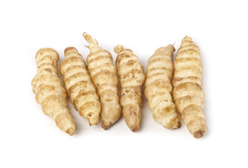 Ground silkworms and fresh poached vegetables showcase unique dietary options for health enthusiasts