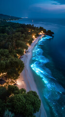 Drone shot , amazing of blue light plankton in the sea around the island.
