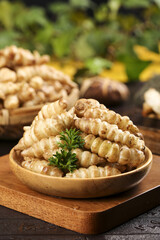 Freshly harvested Mannazi screw cabbage and silkworm gourds presented at Ground Loop Pagoda during...