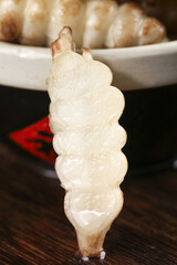 Freshly blended ground gourd and screw vegetables showcasing unique textures in a culinary delight