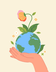 Earth in the palms. A bright flower sprouts from the earth's crust.