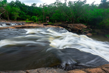 Beautiful waterfall, violent stream in the deep forest.Tropical waterfall Tadtone in climate forest, Chaiyaphum Province in Northeast thailand.