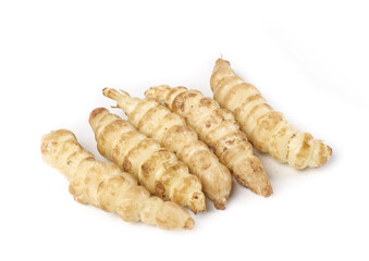 Freshly harvested Groundsel roots showing unique texture and shapes for culinary use in healthy...