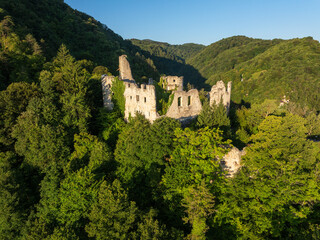 Obraz premium Aerial View of Ruins of an Old Fortress in the Forested Hills near Samobor, Croatia