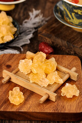 Handmade large yellow rock candy made from ancient sugar cane, showcasing traditional confectionery...