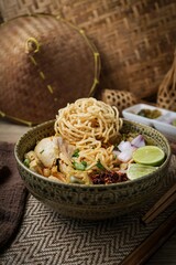 Northern thai curry Noodles with chicken on white background , Thai called  khao soi kai ,Northern food of thailand