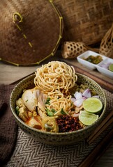 Northern thai curry Noodles with chicken on white background , Thai called  khao soi kai ,Northern food of thailand