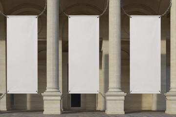 three large vertical rectangular blank banners hanging between classical stone columns