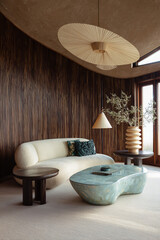 Luxurious living room with organic design. Highlights include the curved sofa, textured wood paneling, and sculptural coffee table. A welcoming and elegant space.