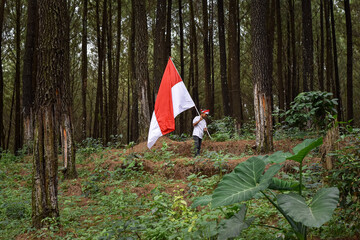 Children waving the red and white flag, Indonesian Independence Day