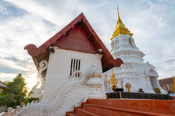 Phra Chaiyaphum Siri Maha Chedi (Arun Dhamma Sathan), which is located in Chaiyaphum, Thailand, is famous place in view under blue sky and sunset clouds. 