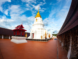 Phra Chaiyaphum Siri Maha Chedi (Arun Dhamma Sathan), which is located in Chaiyaphum, Thailand, is famous place in view under blue sky and sunset clouds. 