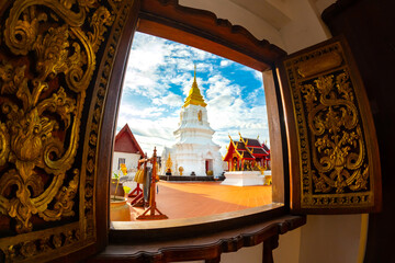 Phra Chaiyaphum Siri Maha Chedi (Arun Dhamma Sathan), which is located in Chaiyaphum, Thailand, is famous place in view under blue sky and sunset clouds. 