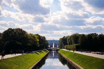 Park ensemble with a central canal and greenery around in the Peterhof area near Saint Petersburg