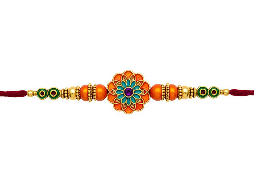 Vibrant indian rakhi bracelet with orange and gold flower medallion on white background