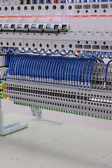 Electrical terminals with connected insulated copper wires with metal lugs. Marking with a thermal...