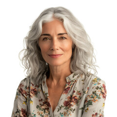 Portrait of a confident mature woman with long, wavy silver hair wearing a floral blouse. background removed