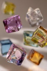 Colorful transparent cubes floating in midair on a light background

