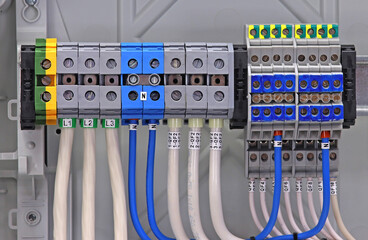 Electrical terminals with connected insulated copper wires with metal lugs. Marking with a thermal...