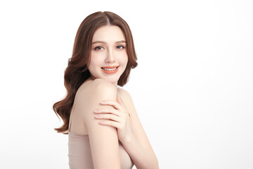 A beautiful young Asian woman with clean, fresh skin against a white background. Skincare, facial...