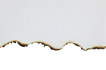 Burnt paper edge for a grunge style border or divider. Vintage design element isolated on white...