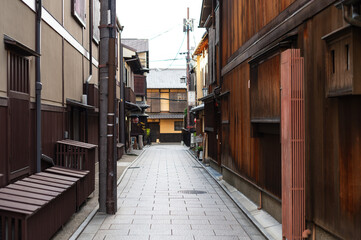 Quiet Traditional Alley in Kyoto, Japan with Wooden Houses