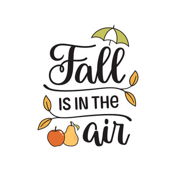 Fall is in the air hand lettering composition with autumn elements umbrella, yellow leaves, apple and pear