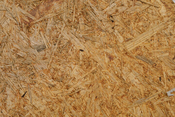 High-resolution image of OSB wood texture. Perfect for construction, DIY, and design projects.