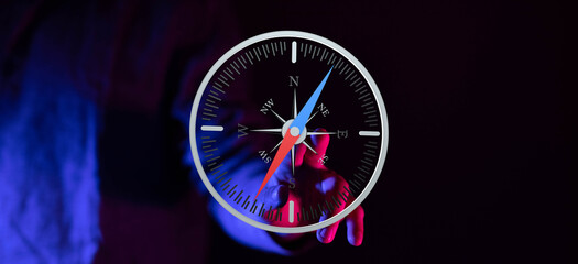 Abstract image of a hand interacting with a digital compass.  Ideal for technology, navigation, or...