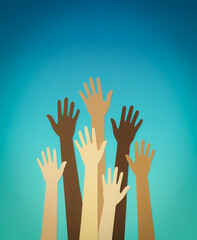 Illustration of raised hands in various skin tones symbolizing unity and diversity, stretching upwards against a bright blue background in paper-cut style.