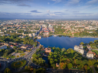 Fototapeta premium Aerial panorama of Kaliningrad, western Russia, featuring the Upper Pond, lush parks, historic and modern Baltic architecture. 