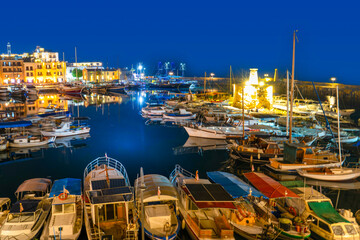 Kyrenia (Girne), Cyprus- July 1, 2025: Blue hour view in Kyrenia harbor which is currently a famous...