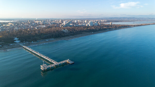 Burgas, Bulgaria - December 22, 2024: The view from the Burgas Bridge is filled with people admiring the view. It is the symbol of the city.