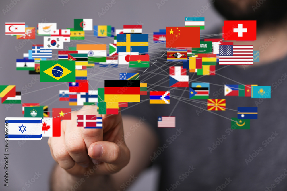 Poster image of interconnected world flags symbolizing global collaboration and communication.