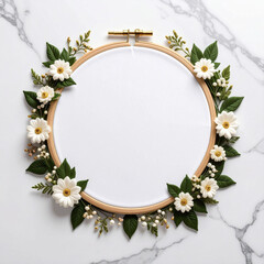 a circular wooden frame, which contains white fabric, is embellished with flowers and greenery. the ring's hardware sits at the top center