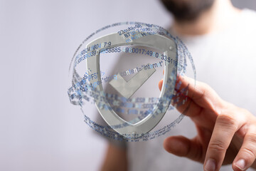 Image depicts a digital shield with a checkmark, representing data security and online protection.