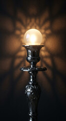 Ornate silver candlestick with illuminated glass bulb, casting intricate shadows on dark background, symbolizing elegance, light, and ambiance