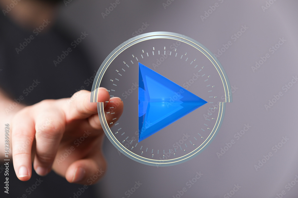 Poster hand interacting with a futuristic play button interface. modern technology concept.