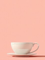 A white ceramic cup sits elegantly on a saucer, set against a soft pink background. The minimalistic design highlights the contours of the cup, creating a serene atmosphere.