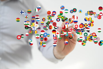 Image of diverse flags representing global connections, partnerships, and international business.