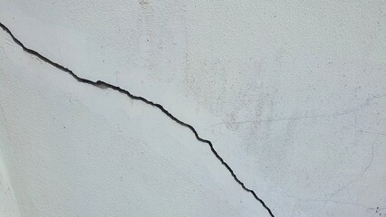Cracks on concrete walls. Construction problems.