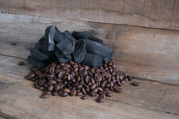 Coffee beans on a wooden background